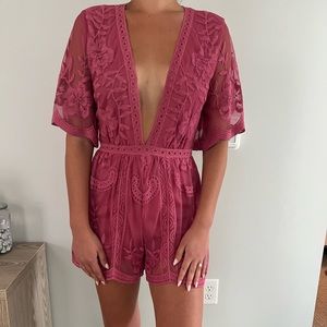Pink romper - size small
